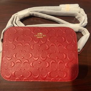 New Red Coach Crossbody purse.